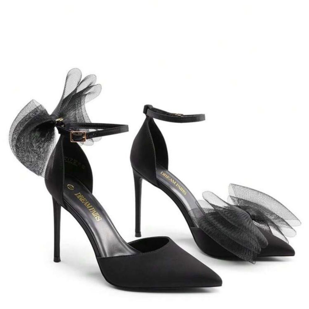 Black pointed toe bow pumps